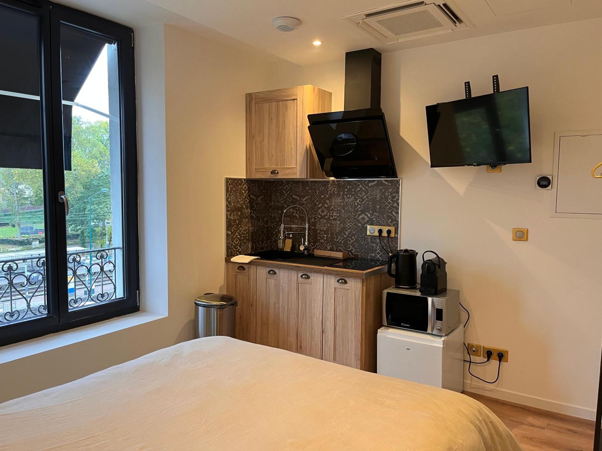 Hdg Hotel Gare De L'Isle Adam Appart'S Hotel Parmain Bagian luar foto